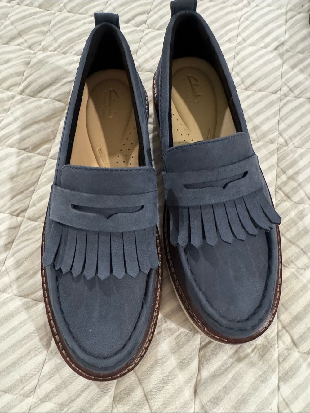 Clarks Women’s Blue Nubuck Fringe Penny Loafers